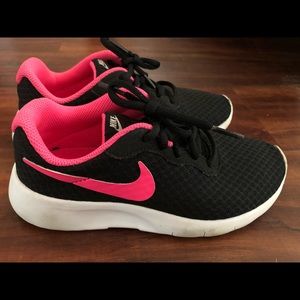 Black and pink Nike sneakers